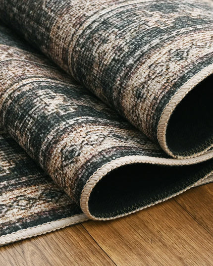 Patterned rug on a wooden floor