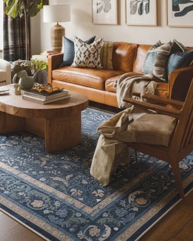 Cozy living room with brown leather sofa, wooden coffee table, and decorative rug.